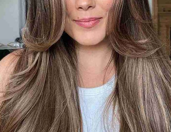 22. Long Layers with Face-Framing Highlights